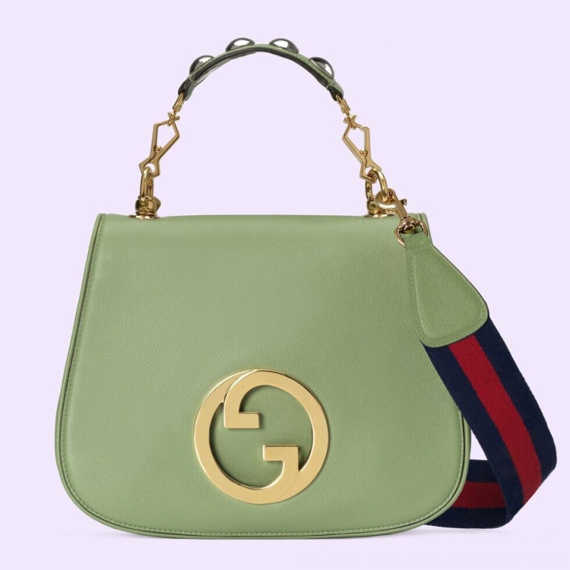 G*u*i top handle bags
